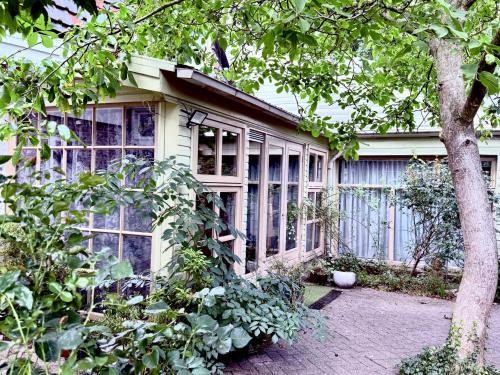 Sprang-Capelle House | Entire spacious 6 persons house with a secret Forest Garden