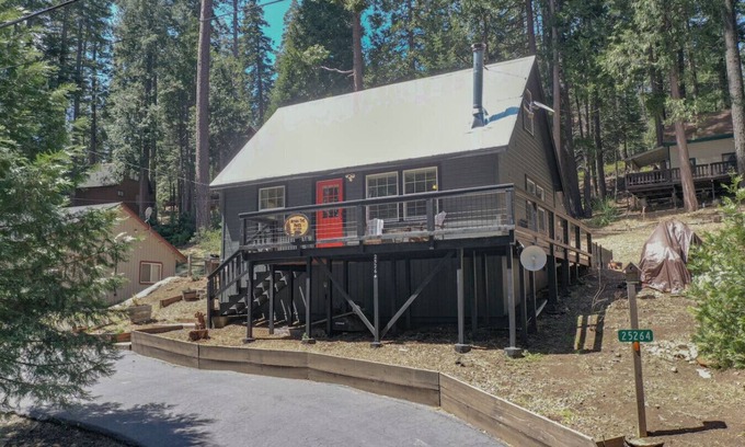 Long Barn Cabin | Escape to a cozy cabin in the pines where you can unwind, relax, and reconnect with nature.
