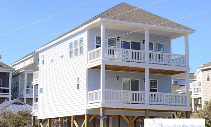 Surf City House | Escape to great views of the ocean & sound in this sun soaked reverse plan home