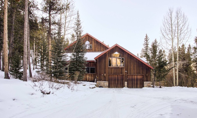 Dunkin Hill House | Experience luxury at Stormbunker Paradise, a spacious 4-bedroom house with stunning wooded views!