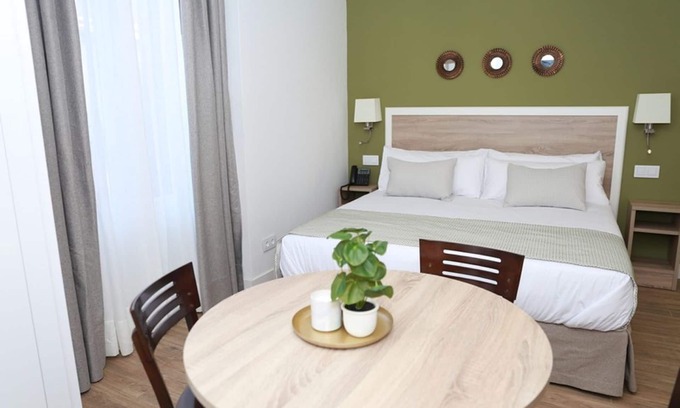 Sol Apartment | Exterior studio with a balcony for 2 people