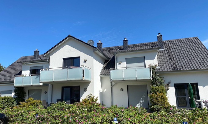 Thiessow Apartment | F: Haus Düne Whg. 03 with fireplace & south/west terrace & balcony - Haus Düne Whg. 03