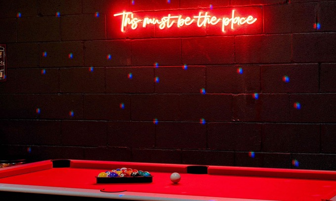 Katie Hill Neighborhood House | Fall rooftop decks, hot tub, speakeasy lounge near Broadway
