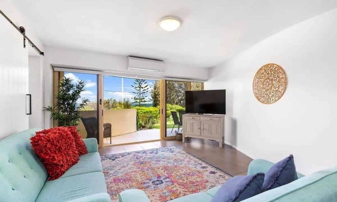 Moreton Bay Region Apartment | Family-friendly, oceanfront apartment with salt-water pool and private garden!