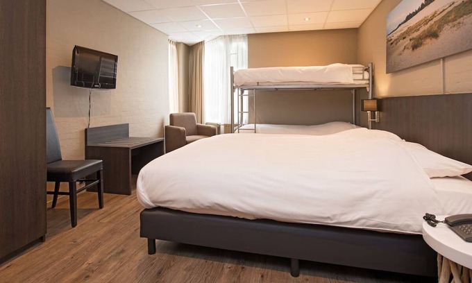 Vlijmen Hotel | Family-friendly Room Near Golf Courses and Nature Trails in Brabant w/Parking