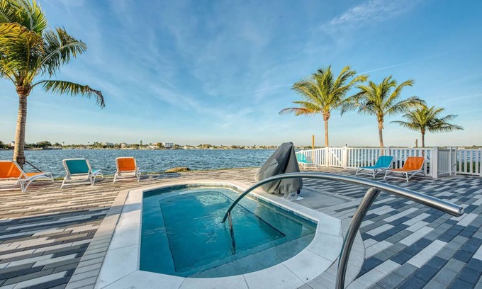 Treasure Island Hotel | Family Friendly Waterfront Retreat! 3 Modern Suites w/Pool & Free Parking!