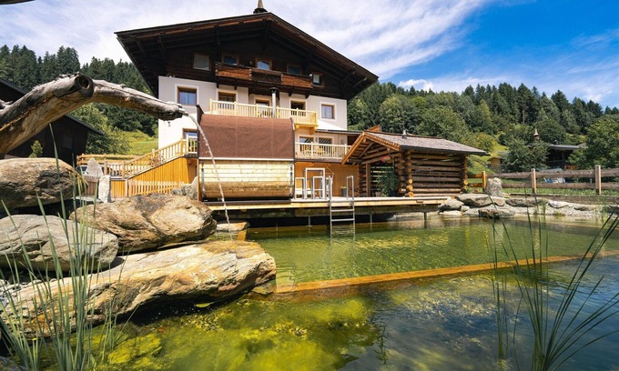 Bramberg am Wildkogel House | Farmhouse in Bramberg with Natural Pond