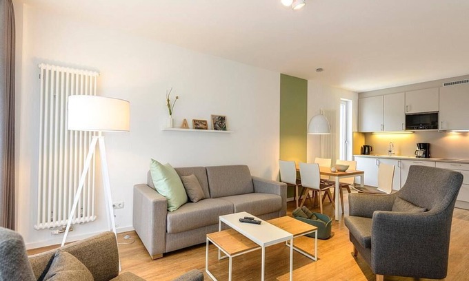 Bensersiel Apartment | Ferienapartment mit Terrasse Inkl. Freier Nutzung von Saunabereich & Schwimmbad