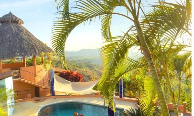 Compostela House | Find tranquility and escape tourism in this hillside home close to beaches