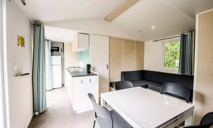 Pressignac House | Flower Lake Camping * - Mobil-home Limousin Comfort 30m2 - 3 bedrooms + covered terrace + TV 6 persons