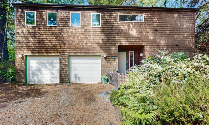 Manzanita House | Forest-view home w/fireplace, deck - Walk to the Beach & Golf Course
