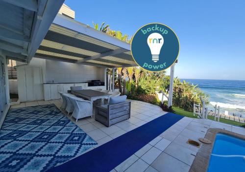 Shaka's Rock House | Four Bedroom Main plus 2 Bedroom Cottage Ballito Beachfront KTL1