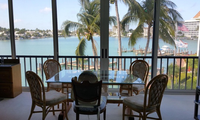 Moorings Condo | Front unit overlooking Moorings bay - 7 min walk to the Beach. 2 boat slips