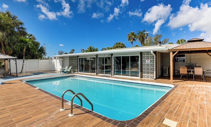 Whitney Beach House | Furnished Sunroom w/TV! Canal-Front Bradenton Gem
