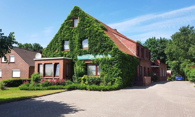 Dornumergrode Apartment | Gästehaus Zur alten Post - Wohnung Süd