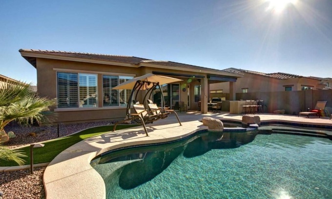 Estrella Mountain Ranch House | Gated Golf Course community with beautiful backyard oasis!