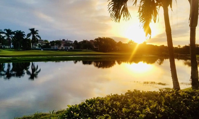 St. David's Island House | Gated Grand Harbor Townhome with beautiful views of the golf course and water