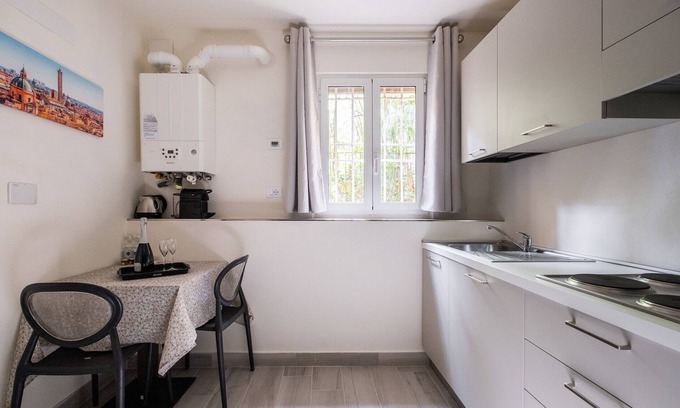 Historic Center Apartment | Giardini Margherita White Studio by Wonderful Italy