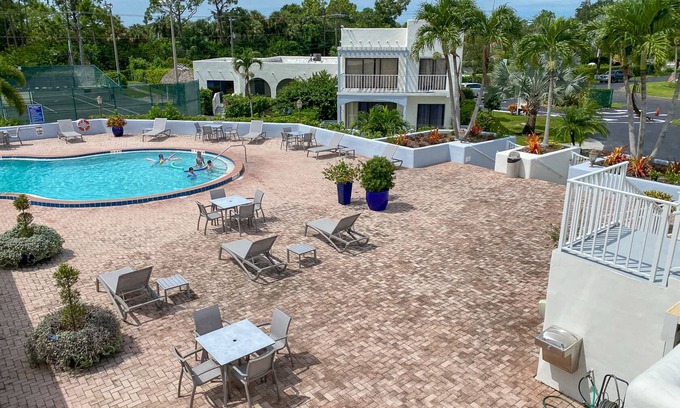 Central Naples Condo | Gorgeous Ground Floor Condo in World Class Resort, Pool, Spa, Amenities Galore!