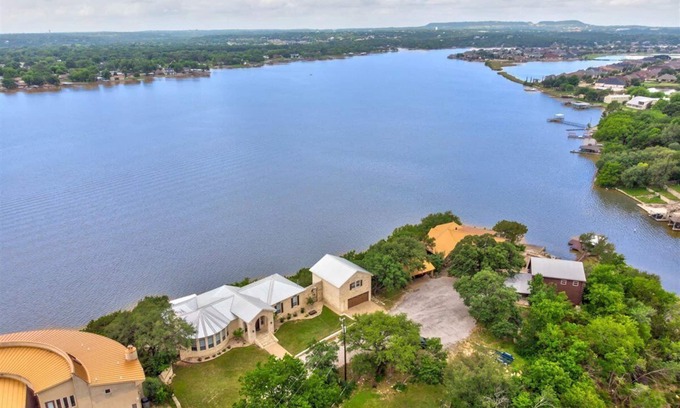 Granbury House | Gorgeous home with a view from every room with swim deck and boat dock
