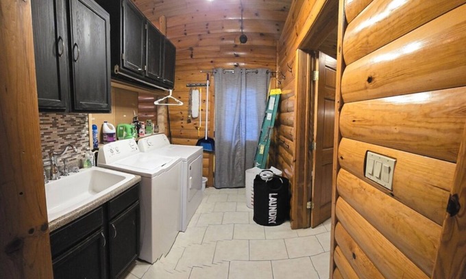 Arenac County Cabin | Gorgeous, Secluded Large Log 4 Bedroom Cabin with a pond view on several acres!