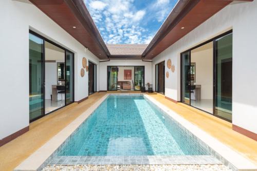 Bang Tao Villa | Gray pool villa phuket