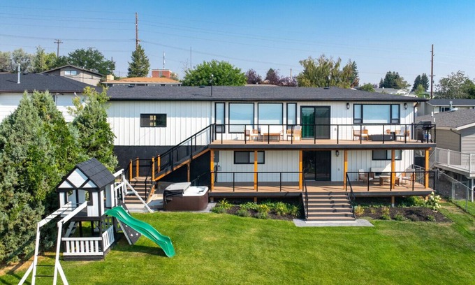 Great Falls House | Great Falls` Ultimate Premier Retreat: Hot Tub, City, Mountain & Missouri River Views with Gaming Area