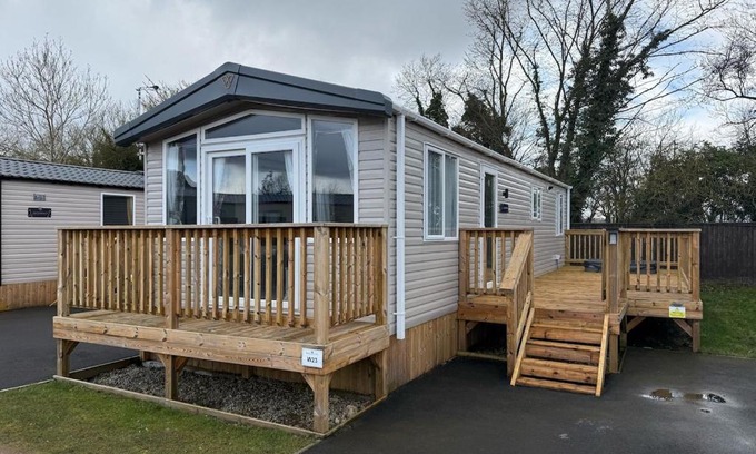Malton House | Grey Goose Lodge with hot tub at Brickyard Lakes