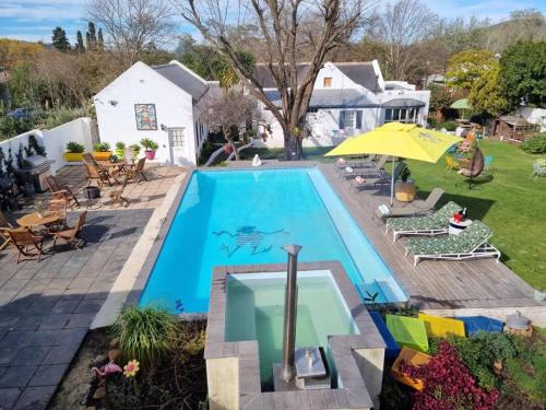 Greyton House | Greyton Toad Hall exclusive use up to 18 and by supplement up to 22 with massive pool and hot tub and sometimes we rent individual rooms