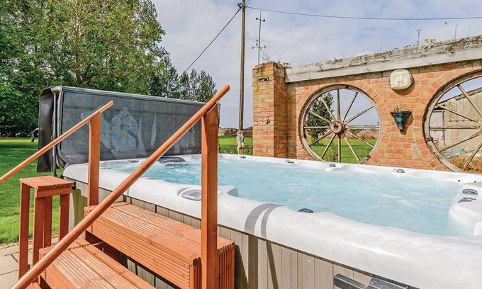 Wisbech Cottage | Ground floor: Three living areas, two with open fire, TV with Freeview/DVD.
