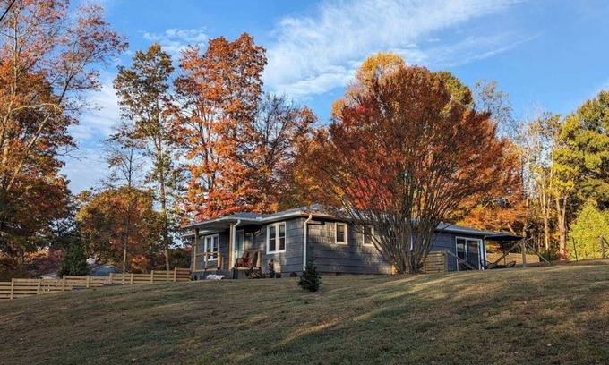 Swannanoa House | Grovemont Retro Retreat A pet-friendly home in Asheville, with a fenced yard & fire pit.