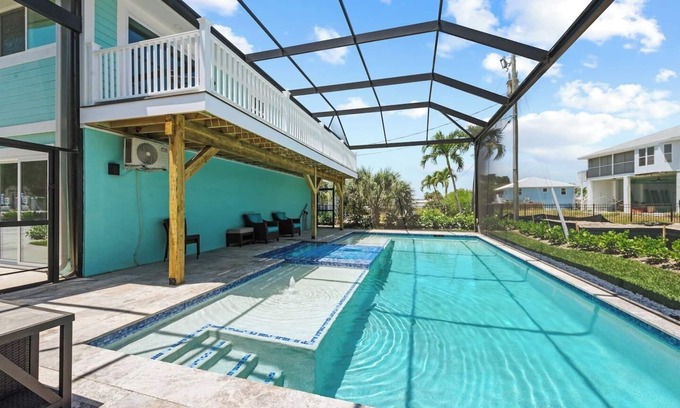 South Island Apartment | Heated Pool Home steps to the beach