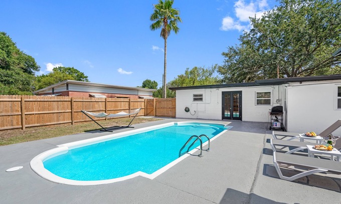 Bearss Plaza House | Heated Pool Home * King Bed