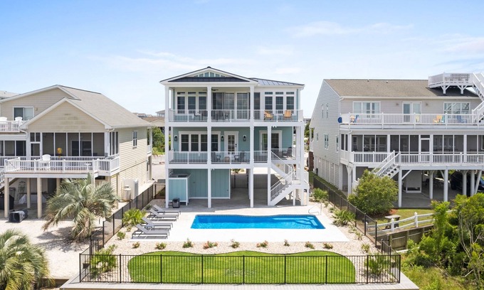 Sunset Beach House | Here Comes the Sunset is a gorgeous home with incredible views of the Sunset Beach Intercoastal waterway and just a short walk to the beach!