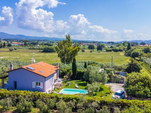 Cecina House | Holiday Home Garden by Interhome