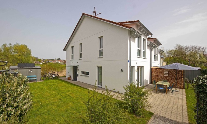 Wasserburg House | Holiday Home 'Moos' with Private Terrace, Shared Garden and Wi-Fi