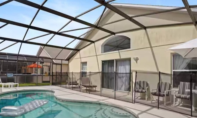 Woodridge House | Home in Clermont| King-sized bed