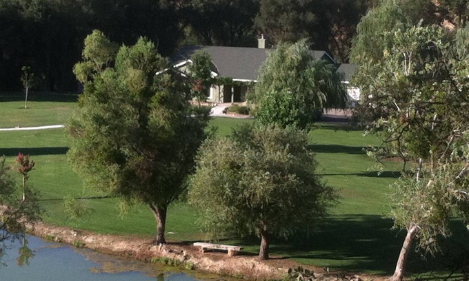 La Grange House | Home in park like setting with 3 acre lake .