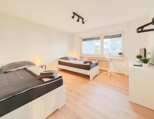 Rhein-Erft-Kreis District Apartment | Home4Now BM02 Monteursunterkunft in Bergheim I 2 Schlafzimmer für 5 Personen I Küche I SmartTV I WiFi I Parkplatz