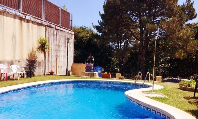 Poio Ski Chalet | Homerez - Big chalet 3 km away from the beach for 12 ppl. with swimming-pool