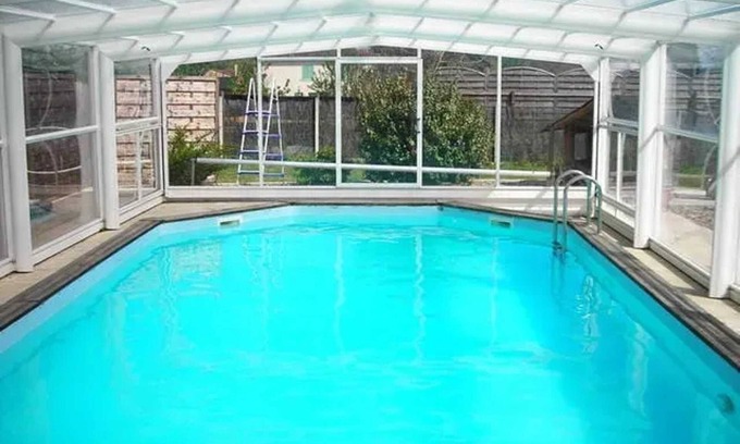 Eymet Ski Chalet | Homerez - Charming Chalet with Shared Pool in Eymet