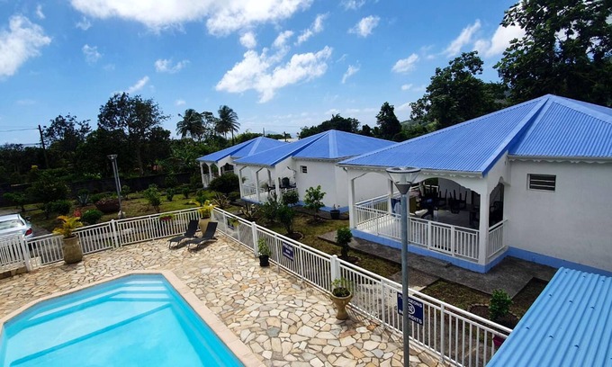 Capesterre-Belle-Eau House | Homerez - Nice bungalow for 4 ppl. with shared pool at Capesterre-Belle-Eau