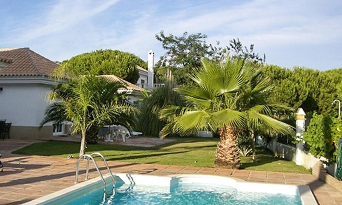 Nuevo Portil Villa | Homerez - Villa 500 m away from the beach for 6 ppl. with shared pool and garden