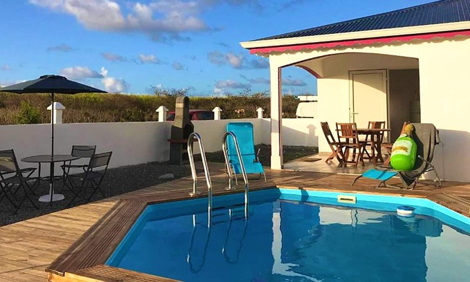 Le Moule Villa | Homerez - Villa for 5 pers. with swimming pool, garden and terrace in Le Moule