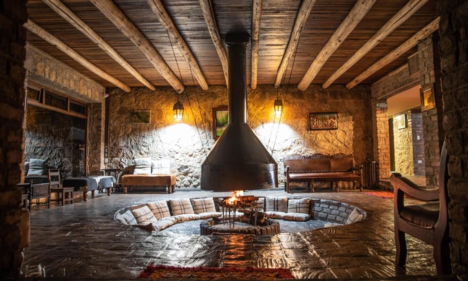 Aquitania Hotel | Hotel refugio pozo azul