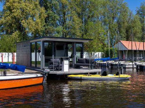 Heeg Boat Rental | Houseboat in Heeg with Stunning Marina Views
