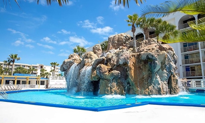 Fort Walton Beach Hotel | Iconic Grotto Pool Views at Seaside Retreat Near Indian Temple Mound Museum