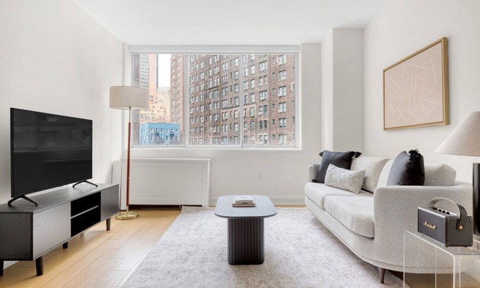 Sutton Place Apartment | Ideal Midtown East 2BR w/Elevator, Doorman & Gym, near UN, by Blueground