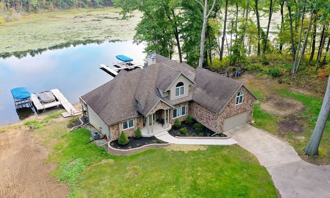 Delton House | Idyllic, Waterfront Home on Crooked Lake with 2.5 Wooded Acres