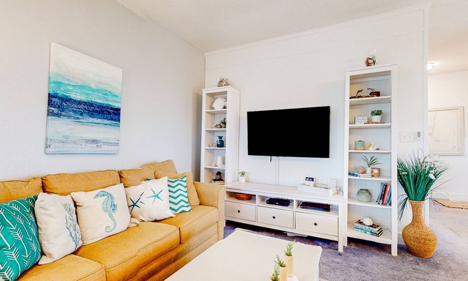 Avon Condo | Incredible waterfront condo with amazing ocean views, pool, deck, & beach access